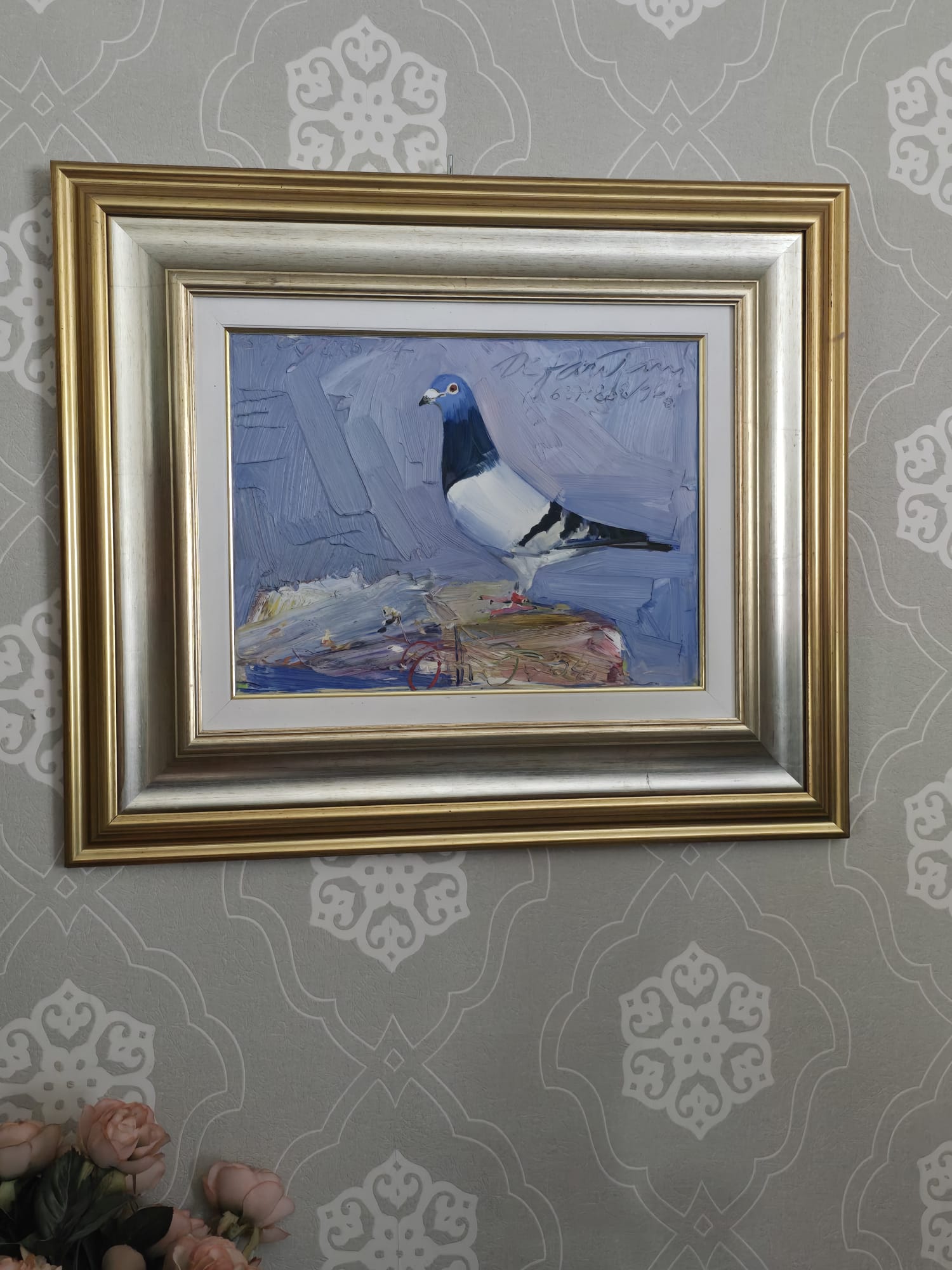 A framed oil painting of a racing pigeon